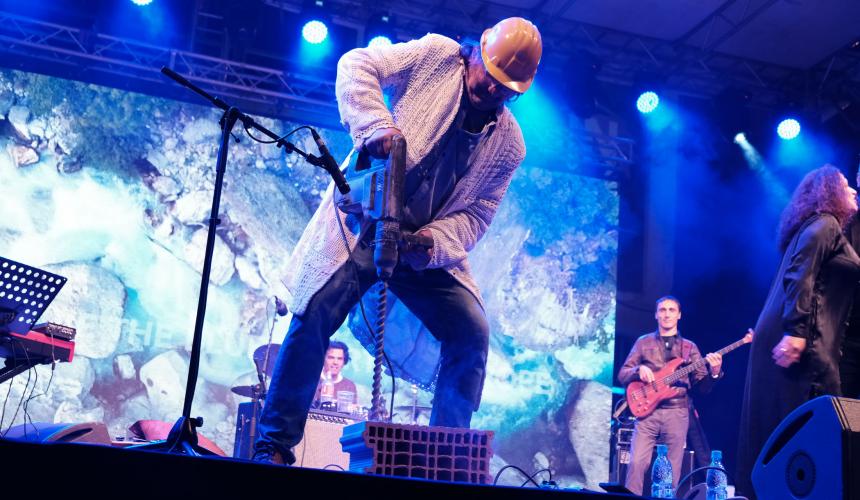 Famous Rambo Amadeus destroyed a symbolic dam on stage with a drill © Nick St. Oegger